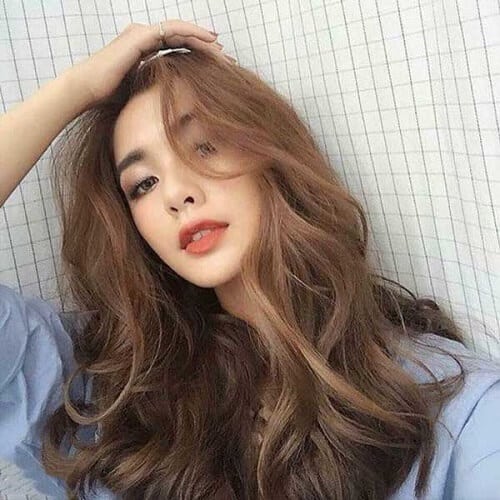 Tóc xoăn sóng nước chia ngôi lệch